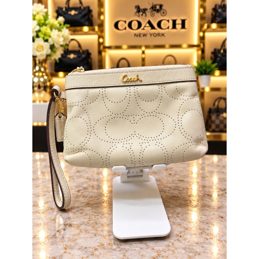 W311 Coach Perforated wristlet